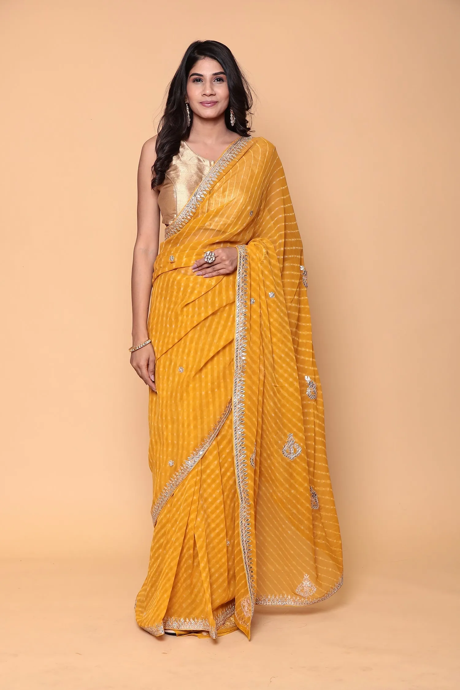 Chiffon Saree with Gota Patti, Mothra work.