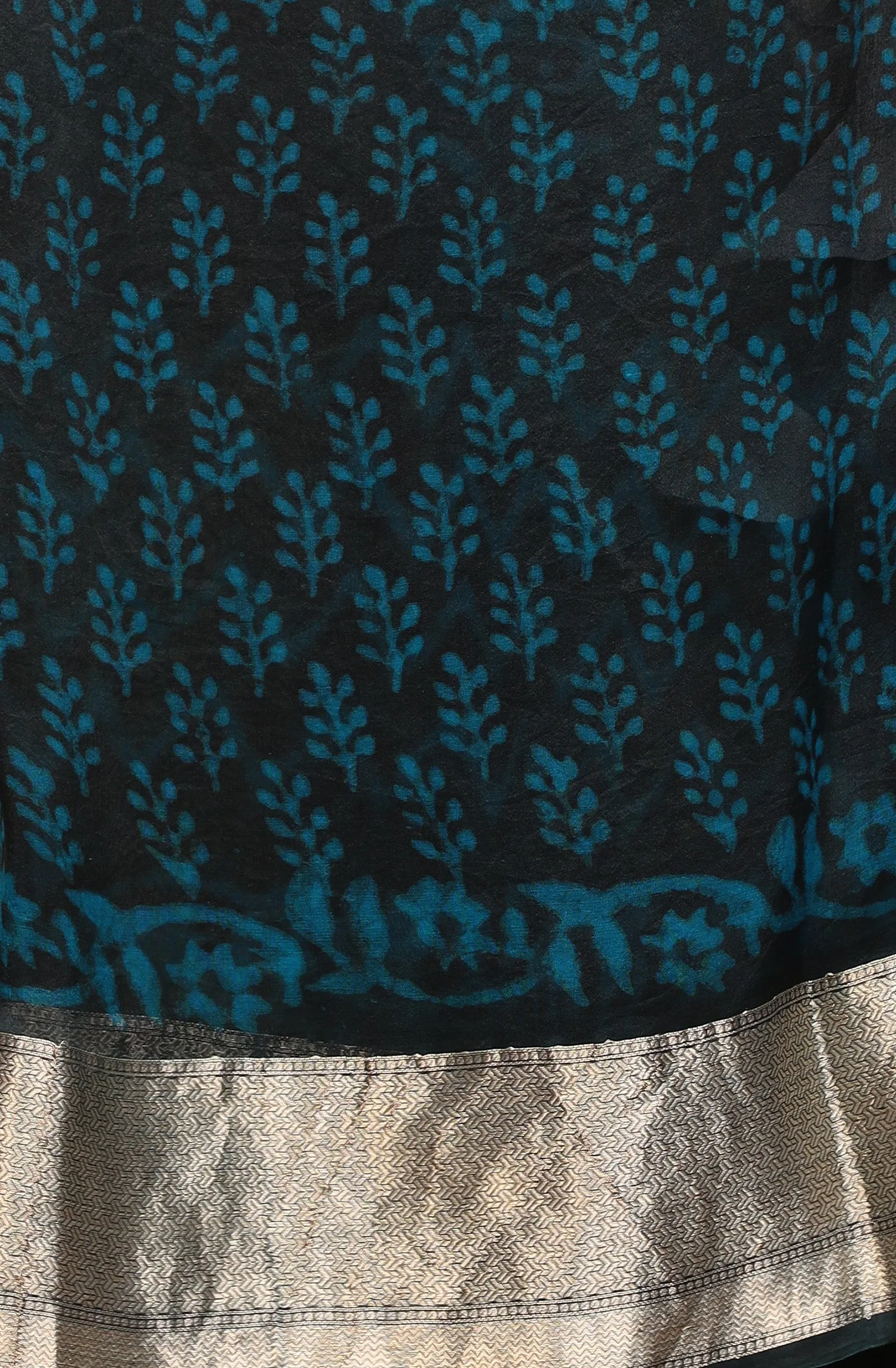 Dabu print Organza Saree with Zari work.