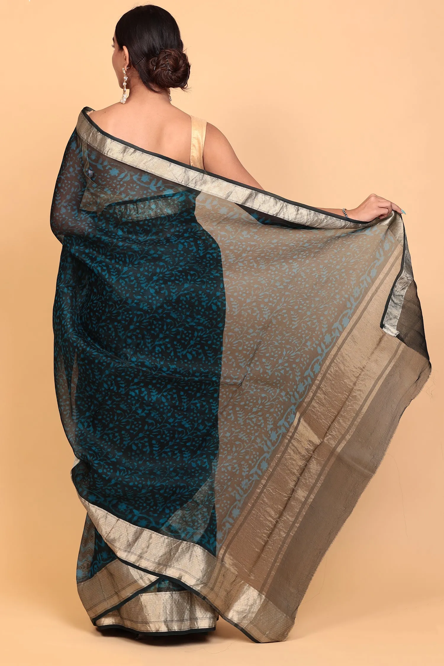 Dabu print Organza Saree with Zari work.