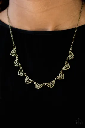 Paparazzi Accessories  - Love And Devotion #N922 Peg - Brass Necklace