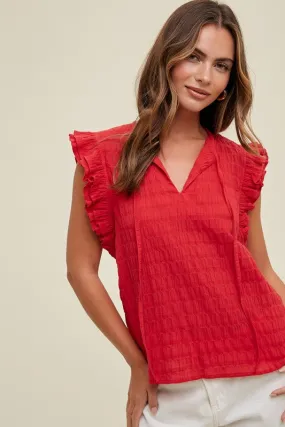 Textured Blouse With Ruffle And Tie Front