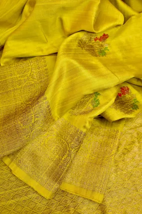 Yellow Color Pure raw Silk Banarasi Saree with Meenakari Butta and Zari Border